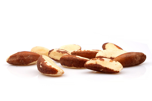 Studio shot of organic brazil nuts on white background
